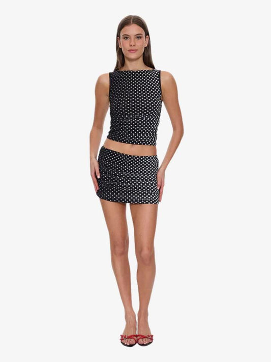 Image of a model wearing Skirts. Productname: Thrills Disconnect Mesh Mini Skirt in Black colour by brand - Thrills
