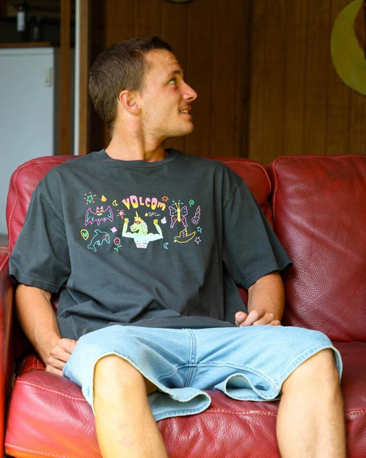 Image of a model wearing Tops. Productname: Volcom Mens Featured Artist Ozzy Powered T-Shirt Stealth - in Stealth colour by brand - Volcom