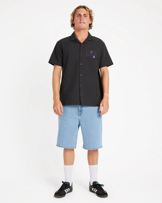 Image of a model wearing Tops. Productname: Volcom Mens Featured Artist Ozzy Woven Short Sleeve Shirt Stealth - in Stealth colour by brand - Volcom