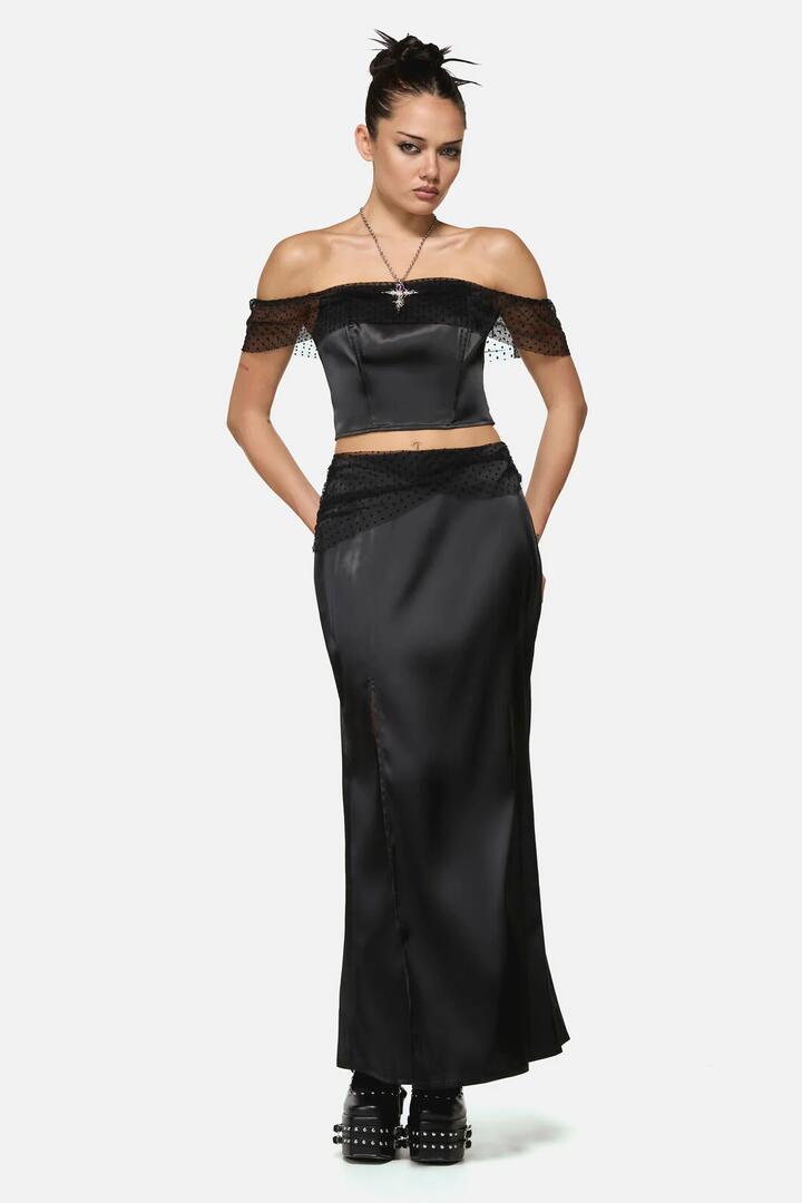 Image of a model wearing Skirts. Productname: Esmeralda Formal Goth Midi Skirt in Black colour by brand - Black Friday