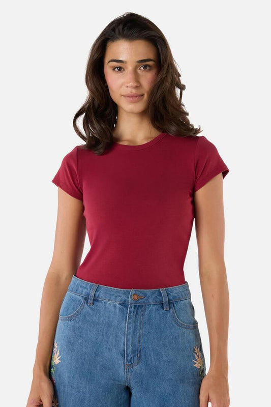 Image of a model wearing Tops. Productname: Jodie Ringer Tee in Berry colour by brand - Princess Highway