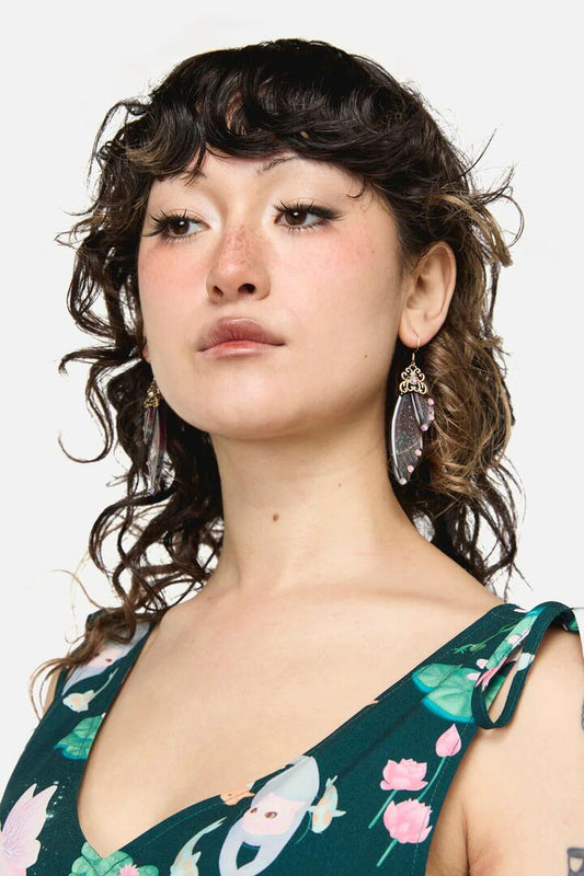 Image of Earrings. Productname: Ornate Wing Earrings in Plum colour by brand - Dangerfield