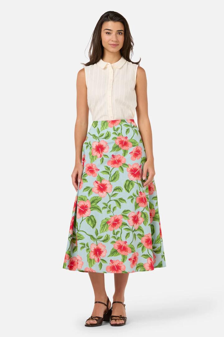 Image of a model wearing Skirts. Productname: Hibiscus Summer Midi Skirt in Blue colour by brand - Princess Highway
