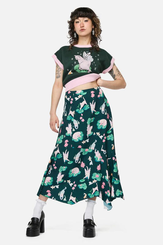 Image of a model wearing Skirts. Productname: Lilycat Cottagecore Midi Skirt in Green colour by brand - Dangerfield