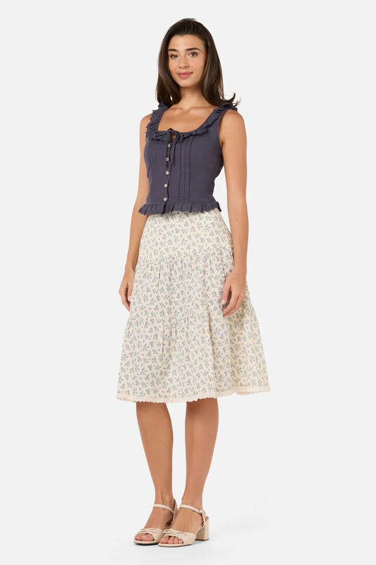 Image of a model wearing Skirts. Productname: Elodie Ditsy Tiered Skirt in Blue colour by brand - Princess Highway