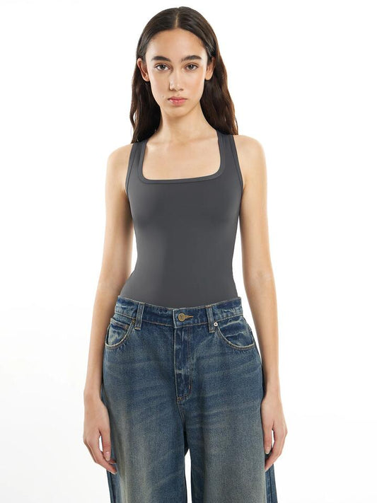 Image of a model wearing Tops. Productname: First Mse Mse Bodysuit in Soot colour by brand - First Mse