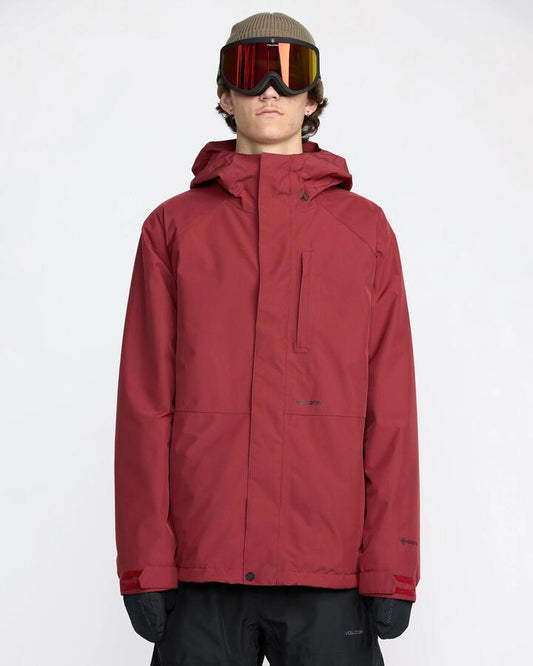 Image of a model wearing Outerwear. Productname: Volcom Mens Dua Gore -Tex Snow Jacket Burnt Red - in Burnt Red colour by brand - Volcom