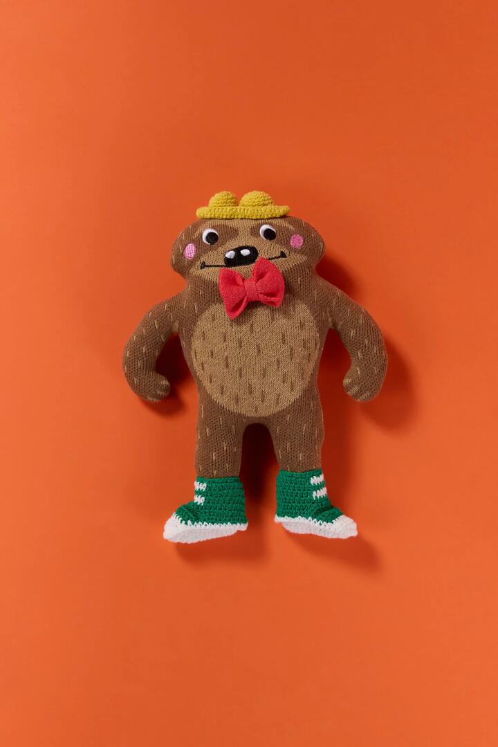 Image of a model wearing Tops. Product name - Sloth Guy Kids Knit Toy in Multi colour by brand - Gorman