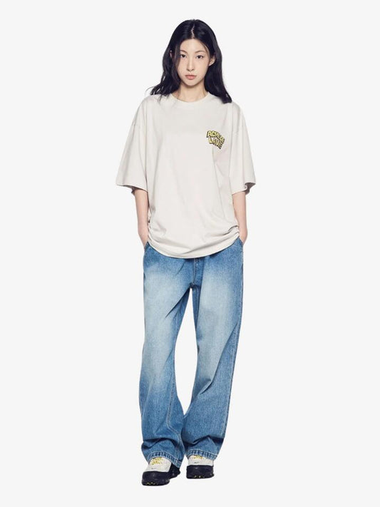 Image of a model wearing Tops. Productname: ADLV Ac Bear Graffiti Short Sleeve T-Shirt in Light Grey colour by brand - ADLV