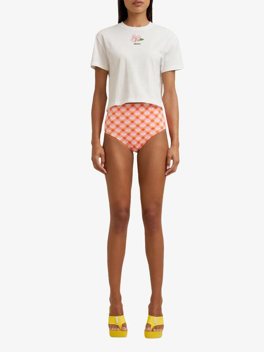 Image of a model wearing Tops. Productname: Doucette Flora Baby Tee in Ivory colour by brand - Doucette