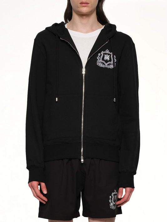 Image of a model wearing Outerwear. Productname: AMIRI MA Crest Zip Hoodie in BLACK colour by brand - AMIRI