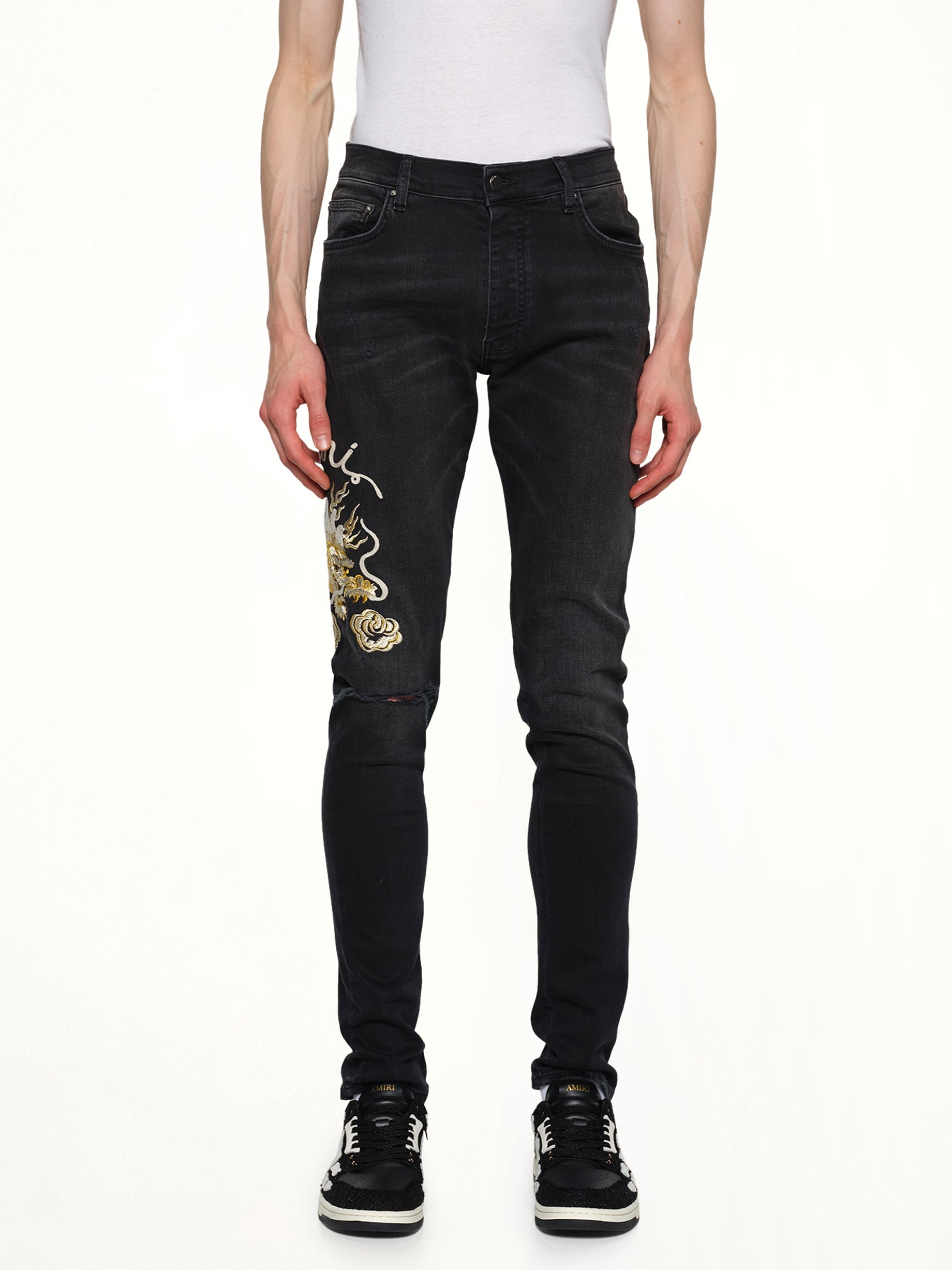 Image of Jeans. Product name - Amiri Dragon Repair Slim Jean in Black colour by brand - AMIRI