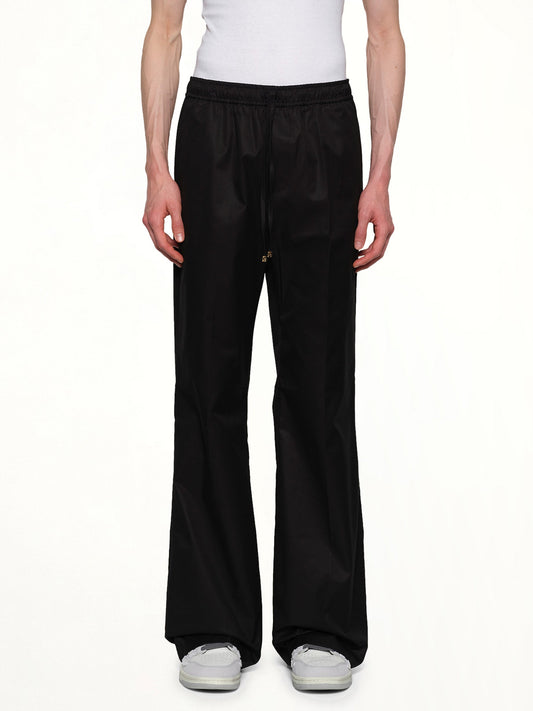 Image of a model wearing Pants. Productname: AMIRI Amiri Straight Pants in BLACK colour by brand - AMIRI