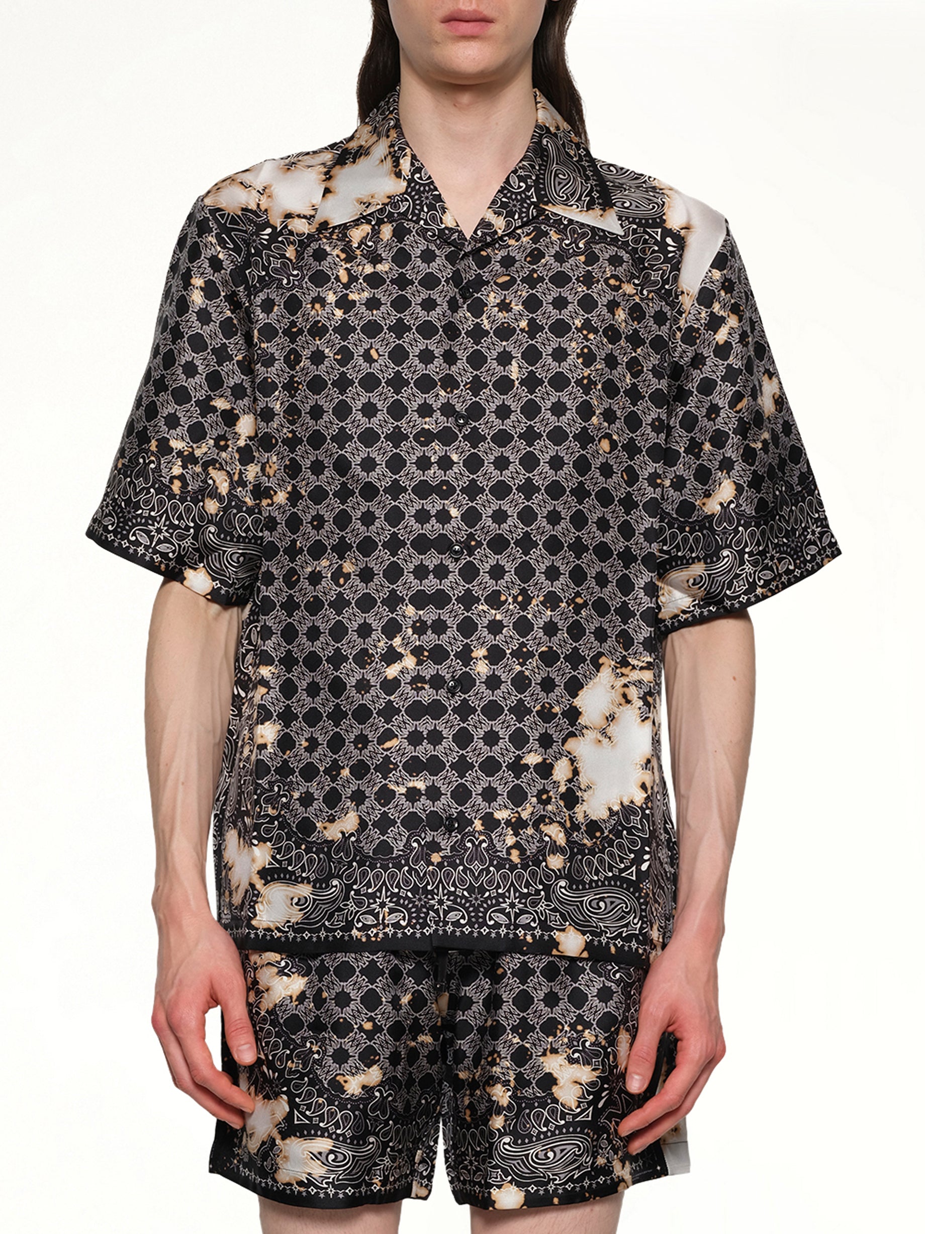 Image of a model wearing Tops. Productname: AMIRI Bleach Bandana Bowling Shirt in BLACK colour by brand - AMIRI