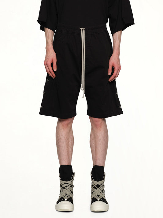 Image of a model wearing Shorts. Productname: RICK OWENS DRKSHDW Pusher Shorts in Black colour by brand - RICK OWENS DRKSHDW