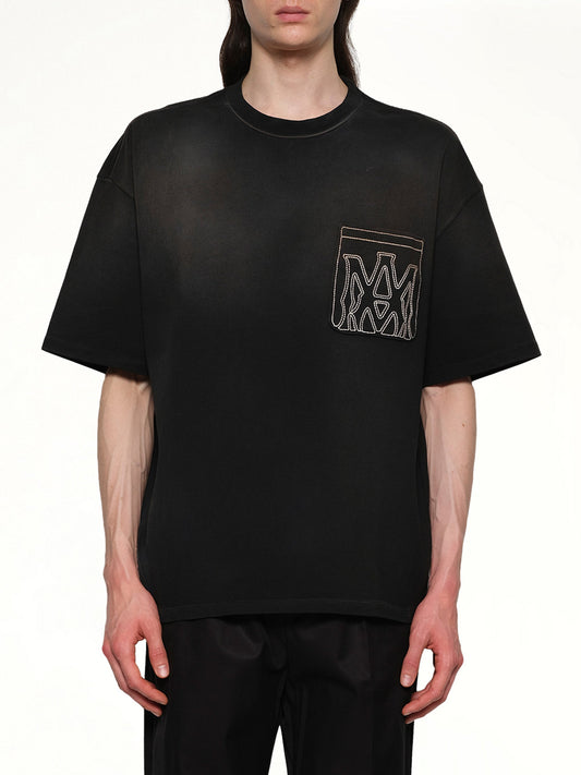 Image of a model wearing Tops. Productname: AMIRI MA Outline Oversize T-Shirt in BLACK colour by brand - AMIRI