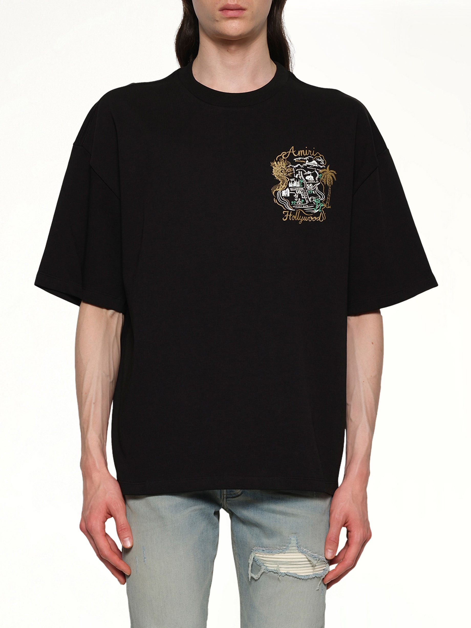 Image of a model wearing Tops. Productname: AMIRI Amiri Hollywood Oversized Tee in BLACK colour by brand - AMIRI