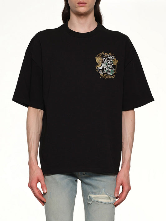 Image of a model wearing Tops. Productname: AMIRI Amiri Hollywood Oversized Tee in BLACK colour by brand - AMIRI