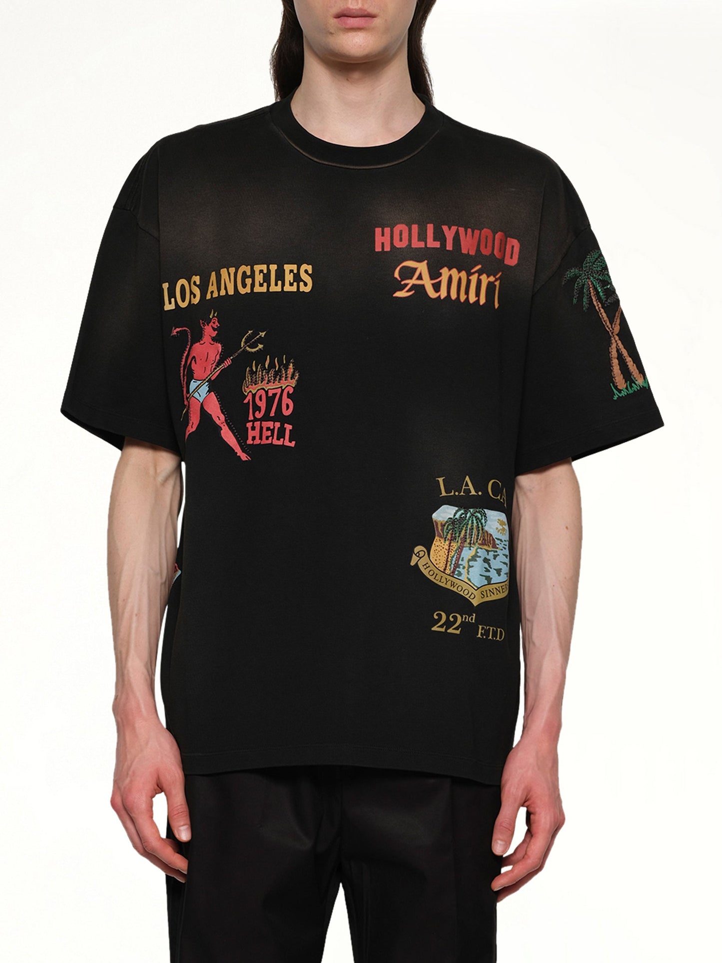 Image of a model wearing Tops. Productname: AMIRI Sinners Oversized T-Shirt in BLACK colour by brand - AMIRI