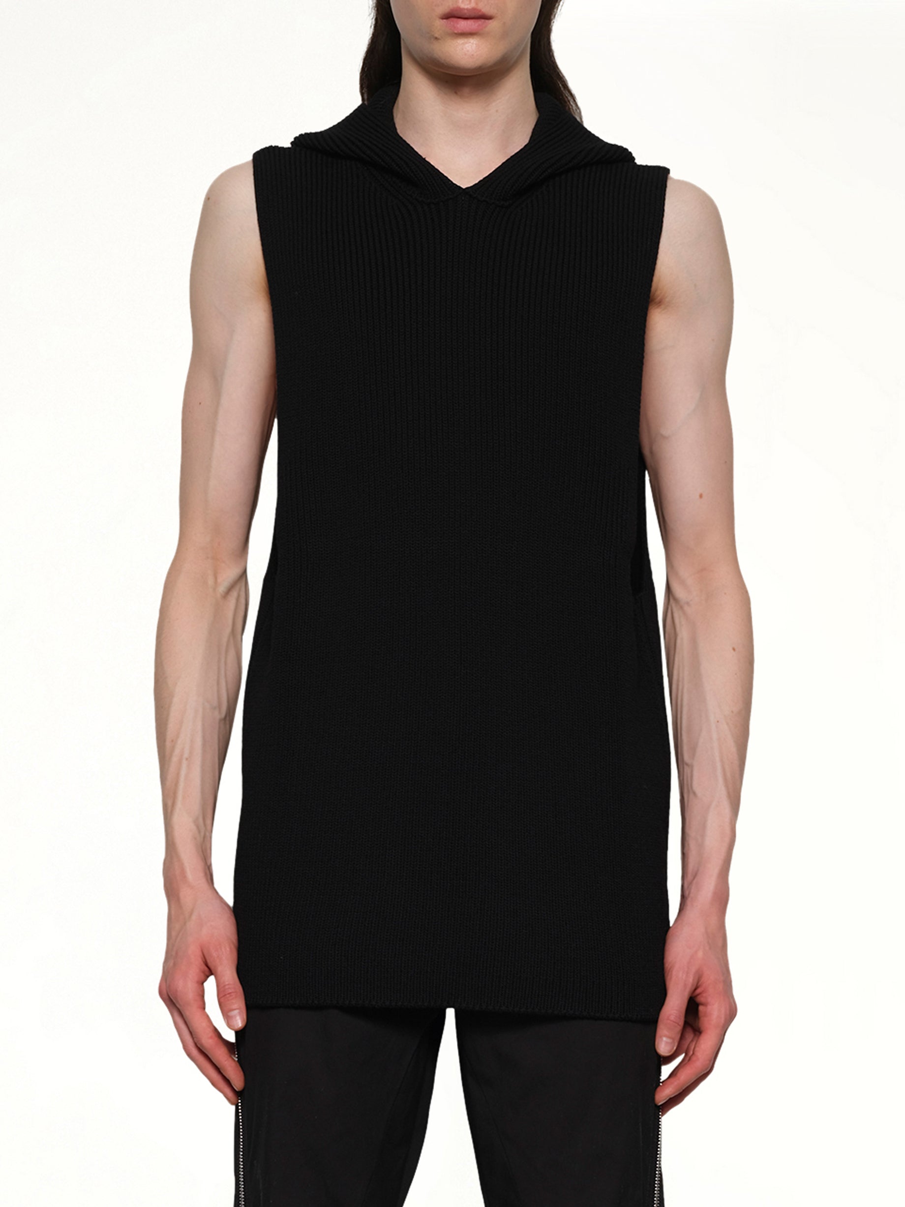 Image of a model wearing Tops. Productname: RICK OWENS Hooded Tank in Black colour by brand - RICK OWENS