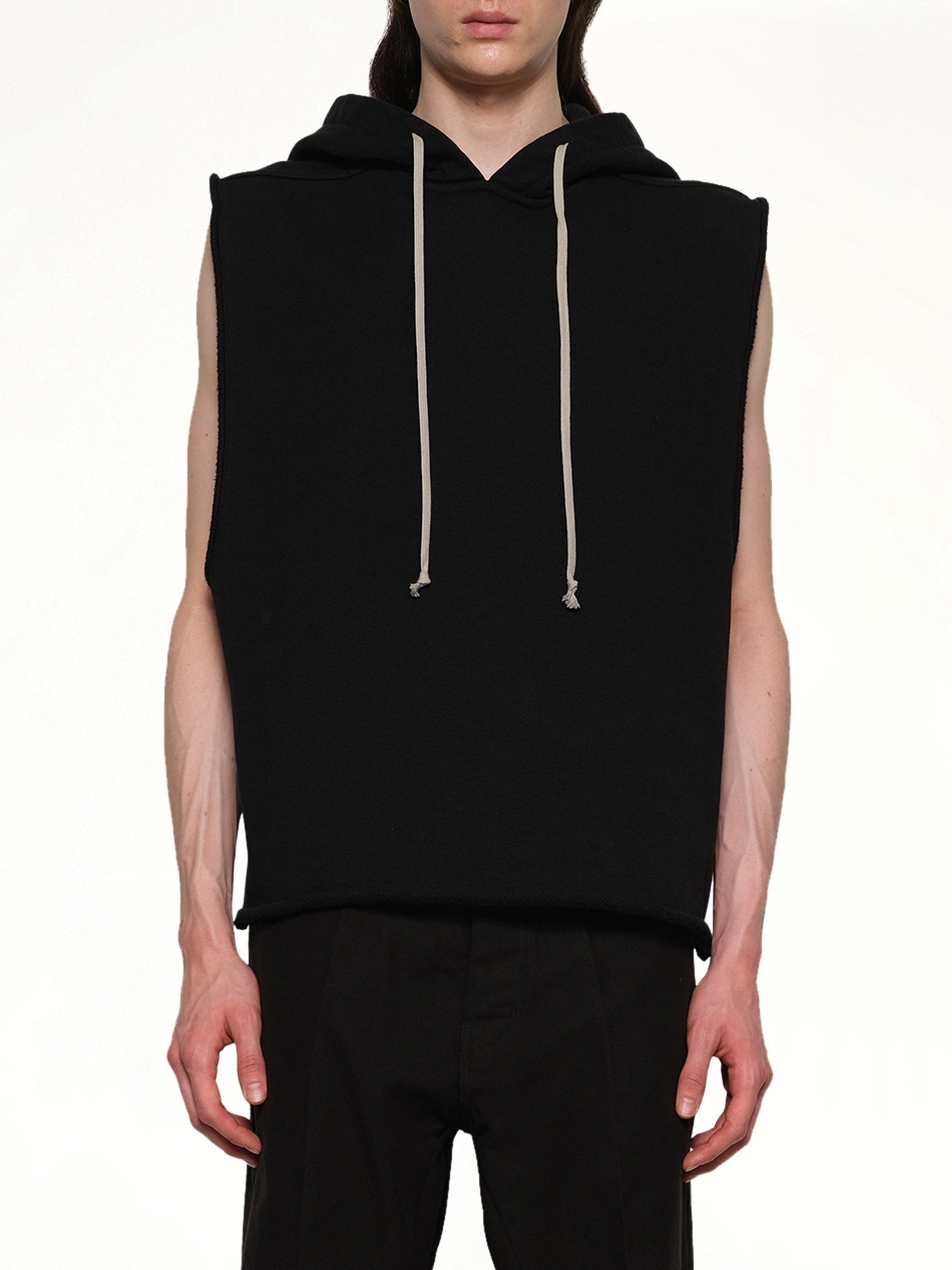 Image of a model wearing Outerwear. Productname: RICK OWENS Knit Hooded Tunic in Black colour by brand - RICK OWENS