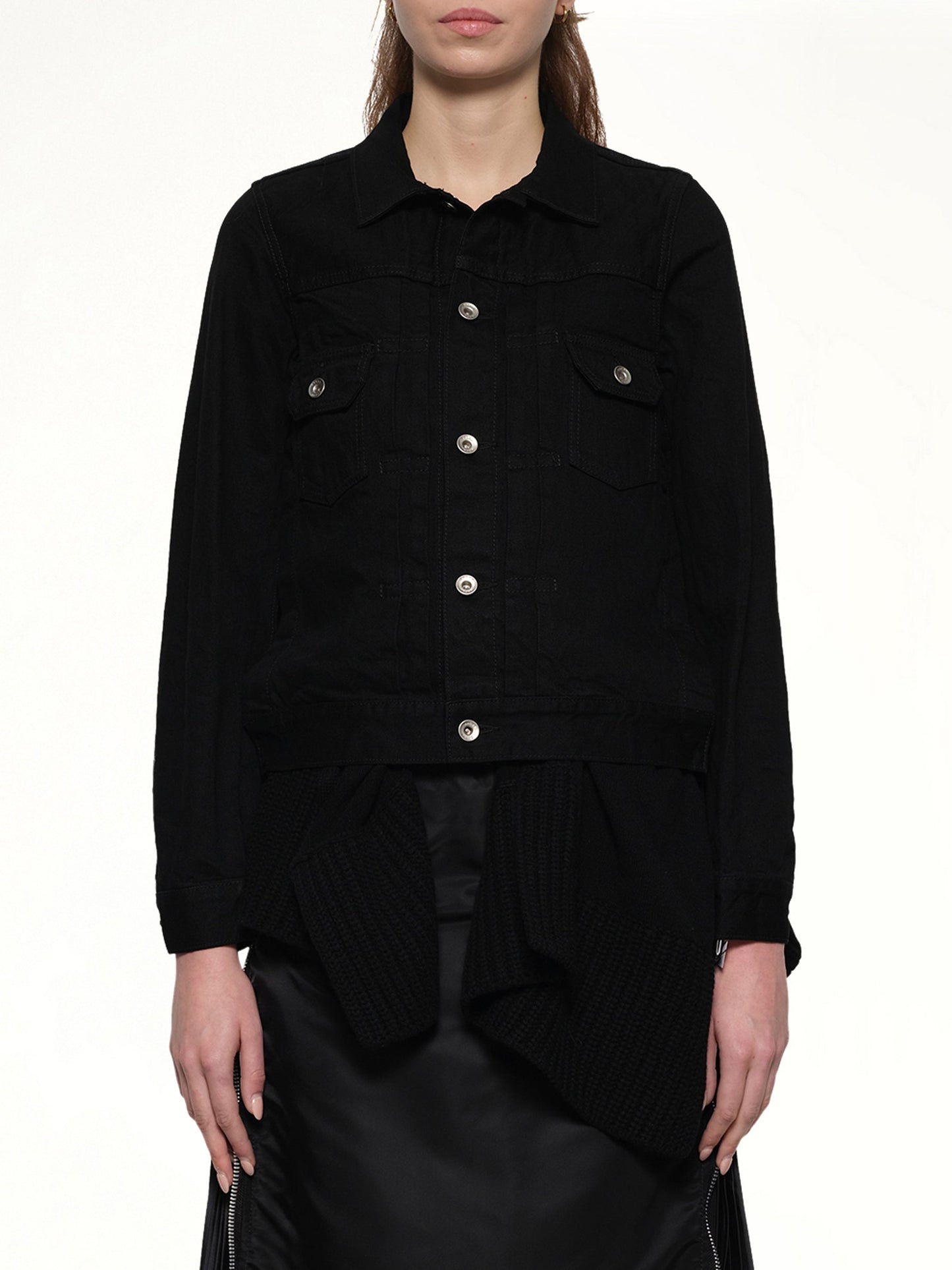 Image of a model wearing Outerwear. Productname: SACAI Denim x Wool Knit Jacket in Black colour by brand - SACAI
