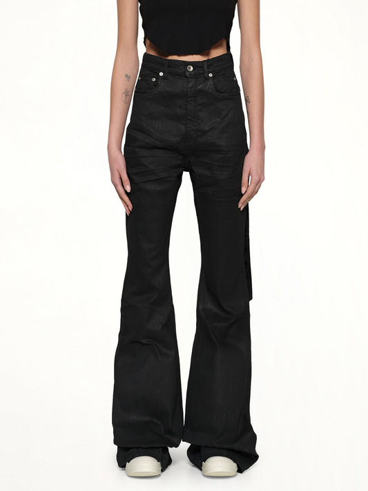 Image of a model wearing Denim. Productname: RICK OWENS DRKSHDW Bolan Bootcut in Black Wax colour by brand - RICK OWENS DRKSHDW