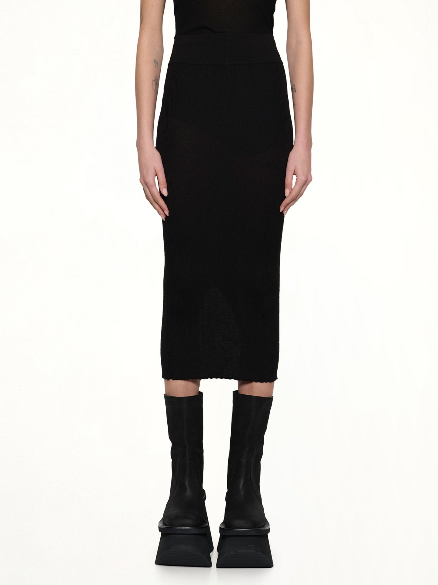 Image of a model wearing Skirts. Productname: RICK OWENS Calf Skirt Motivo in Black colour by brand - RICK OWENS