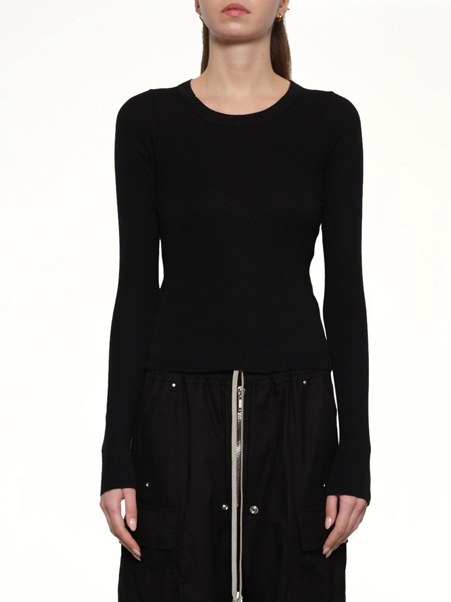 Image of a model wearing Tops. Productname: RICK OWENS Cropped Rib Long Sleeve T in Black colour by brand - RICK OWENS