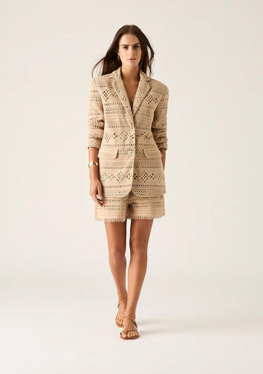 Image of a model wearing Outerwear. Productname: Daniela Textured Blazer in Almond colour by brand - MOS The Label