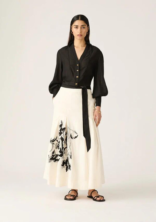 Image of a model wearing Skirts. Productname: Lis Embroidery Midi Skirt in Ivory colour by brand - MOS The Label