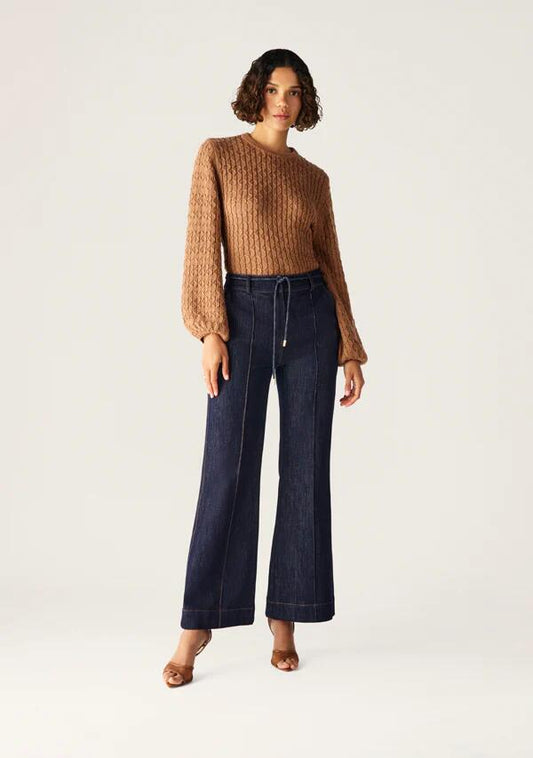 Image of a model wearing Pants. Productname: Diana Flare Pants in Deep Indigo colour by brand - MOS The Label