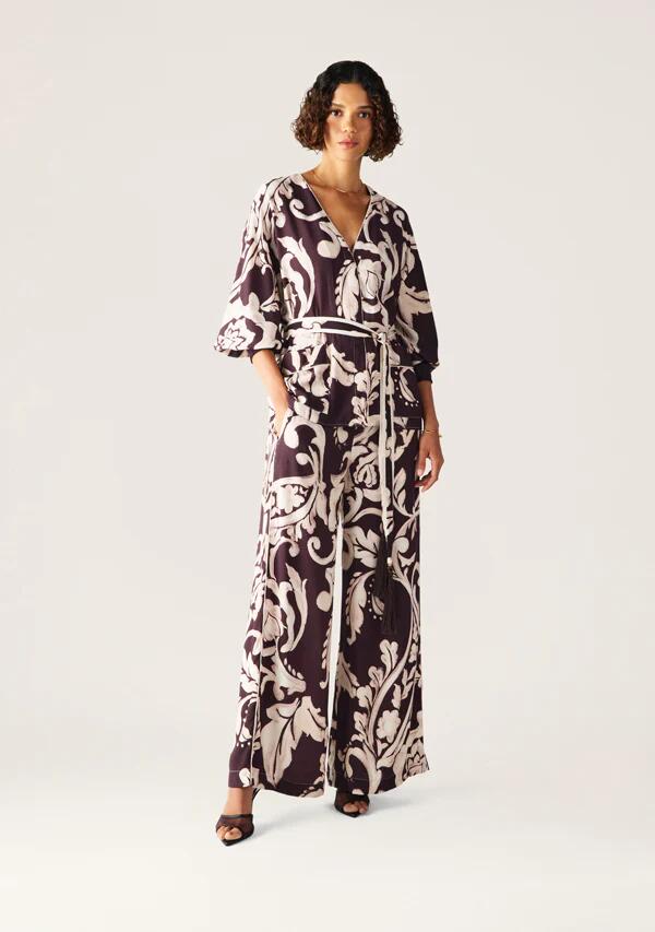 Image of a model wearing Pants. Productname: Seraphine Pants in Seraphine Print colour by brand - MOS The Label