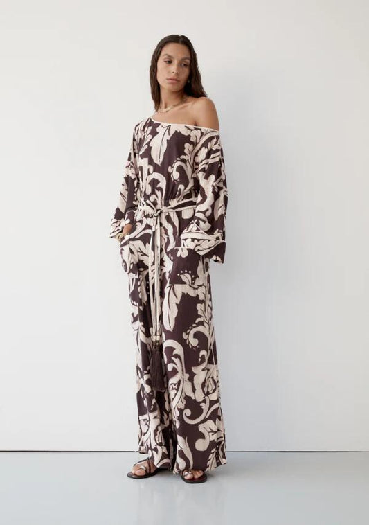 Image of a model wearing Outerwear. Productname: Seraphine Jumpsuit in Seraphine Print colour by brand - MOS The Label