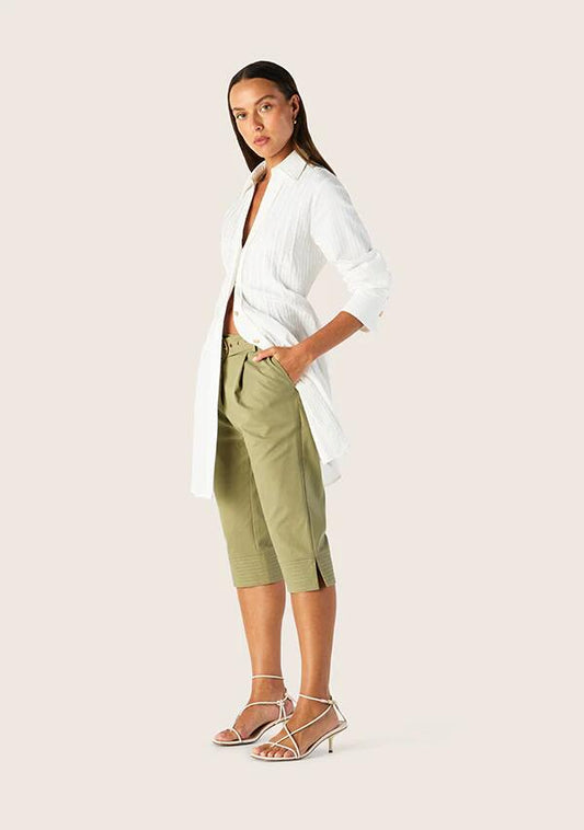 Image of a model wearing Pants. Productname: Mila Capri Pants Olive | MOS The Label in Olive colour by brand - MOS The Label