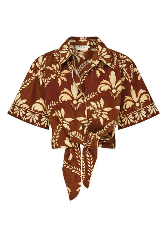 Image of a model wearing Tops. Productname: Deia Print Tie Front Shirt | MOS The Label in Deia Print colour by brand - MOS The Label