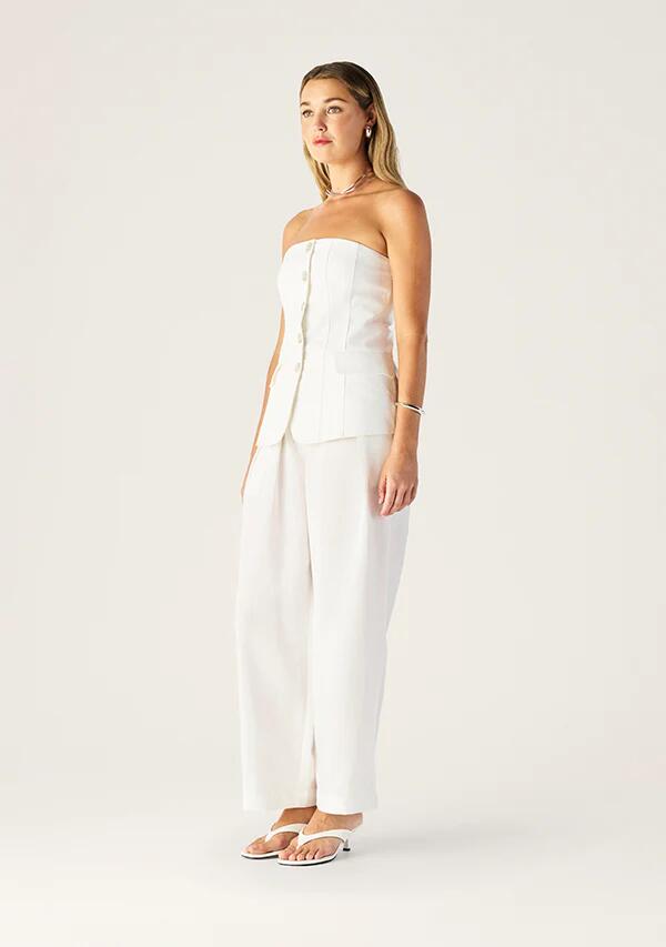 Image of a model wearing Pants. Productname: Monaco Suiting Pants | MOS The Label in Bright White colour by brand - MOS The Label