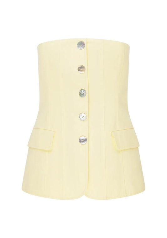 Image of a model wearing Tops. Productname: Monaco Suiting Bustier | MOS The Label in Butter Yellow colour by brand - MOS The Label
