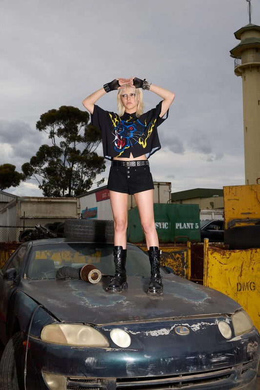 Image of a model wearing Shorts. Productname: Rawr Punk Booty Short in Black colour by brand - Dangerfield
