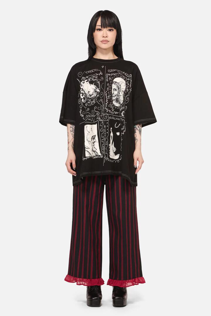 Image of a model wearing Tops. Productname: Framed Goth Oversized Tee in Black colour by brand - Black Friday