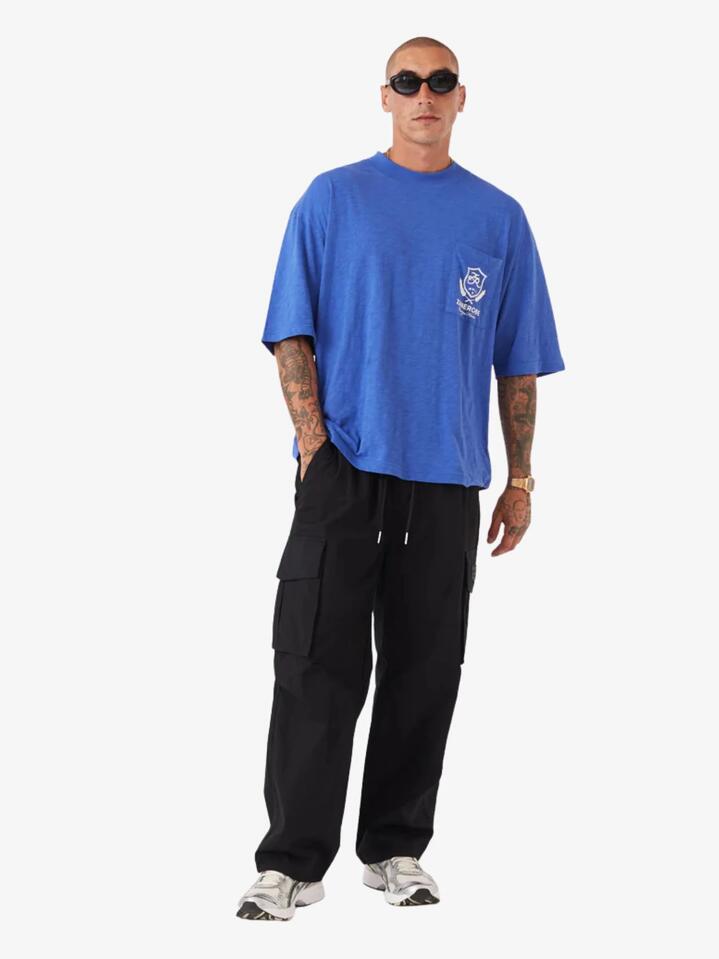 Image of a model wearing Tops. Productname: Zanerobe Crest Slub Flow Tee in Cobalt Blue colour by brand - Zanerobe