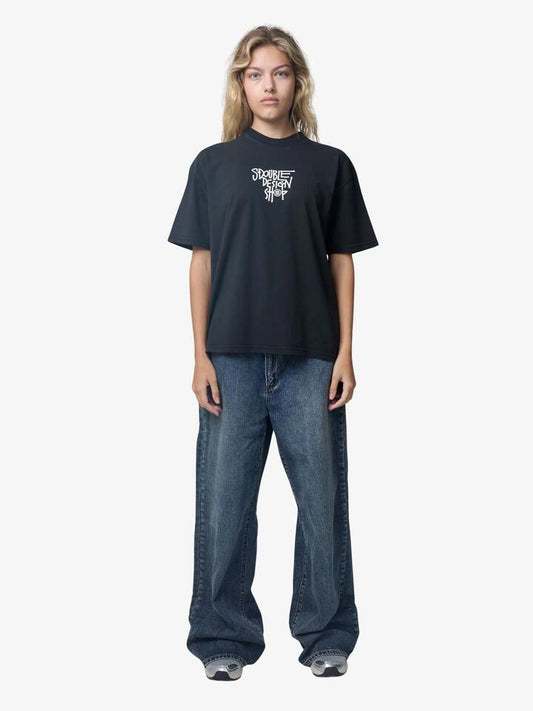 Image of a model wearing Tops. Productname: S-Double Dot Shop Ss Tee in Black colour by brand - S-Double