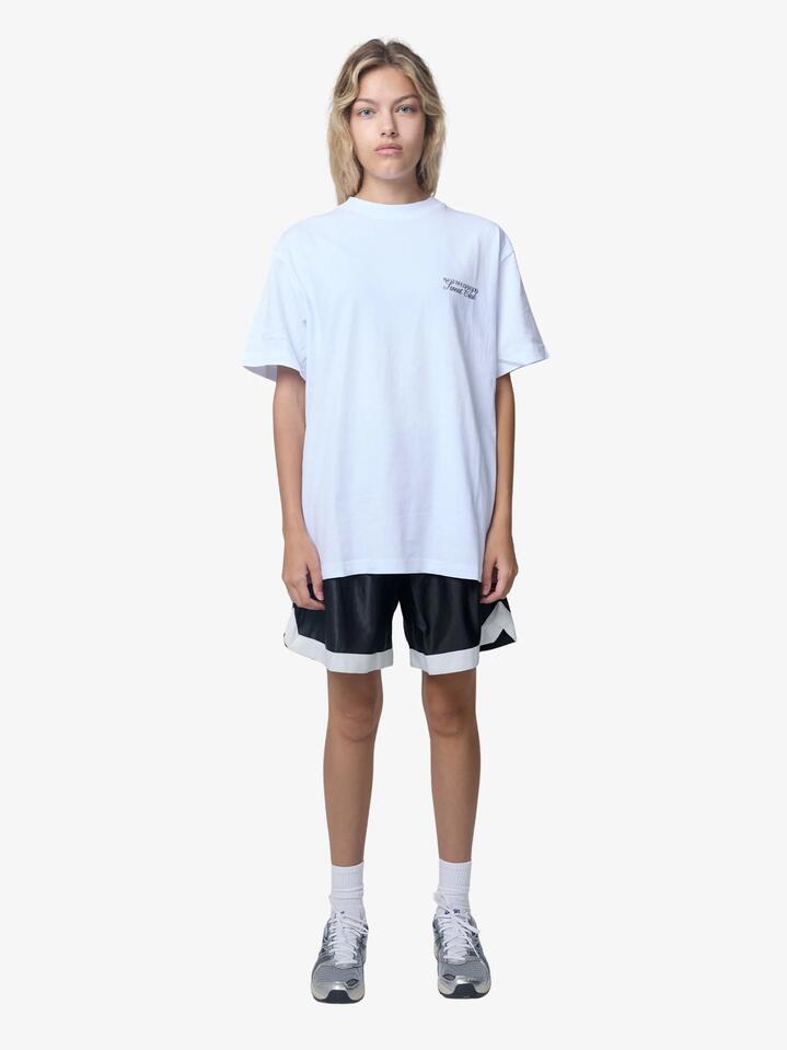 Image of a model wearing Outerwear. Productname: West Hollywood Sweat Club Malibu Tennis Oversized Tee in White colour by brand - West Hollywood Sweat Club