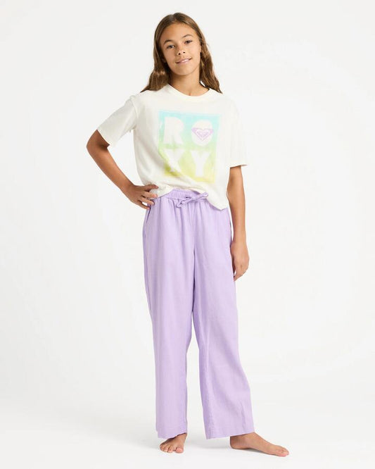 Image of a model wearing Pants. Product name - Roxy Girls 4-16 Lekeito Break Pants Crocus Petal in Crocus Petal colour by brand - Roxy