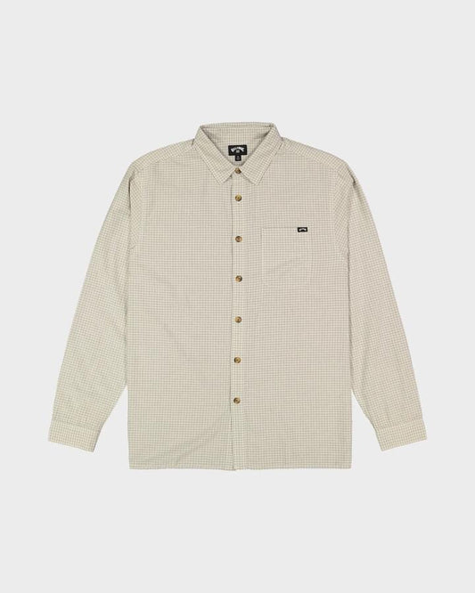 Image of a model wearing Tops. Product name - Billabong Mens Mogul Long Sleeve Shirt Oatmeal in Oatmeal colour by brand - Billabong