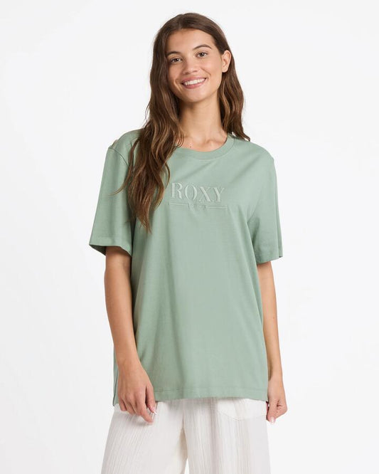 Image of a model wearing Tops. Productname: roxy Womens Sweet Life T-Shirt Sage - in Sage colour by brand - Roxy