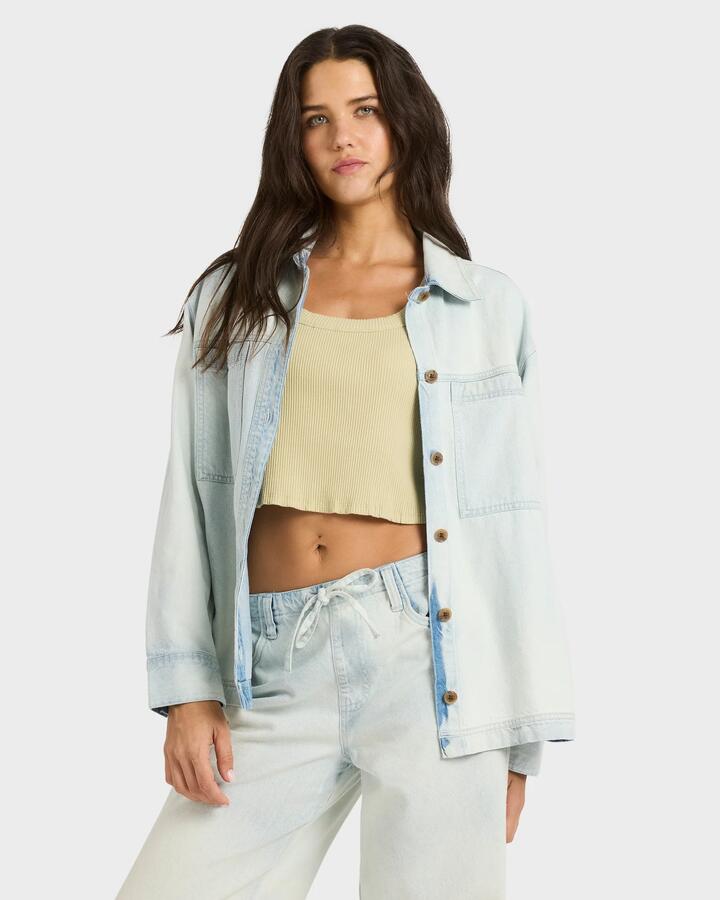 Image of a model wearing Tops. Productname: billabong - Womens Jade Long Sleeve Oversized Shacket - Blue Mist - in Blue Mist colour by brand - billabong