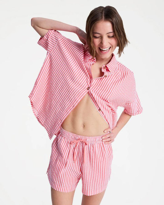 Image of a model wearing Shorts. Productname: roxy - Womens Lekeito Break High Stripe Beach Shorts - Hibiscus Sunrise Stripe - in Hibiscus Sunrise Stripe colour by brand - roxy