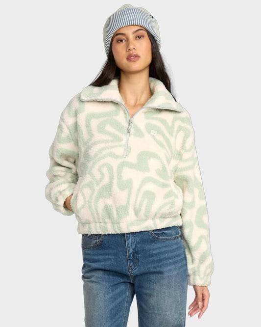 Image of a model wearing Outerwear. Product name - Billabong Womens Barra Half Zip Pullover Green Haze in Green Haze colour by brand - Billabong