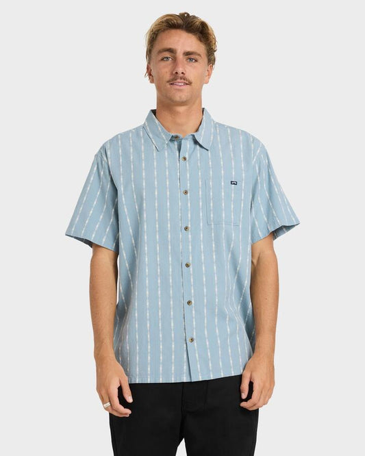 Image of a model wearing Tops. Productname: billabong - Mens Sundays Jacquard Short Sleeve Shirt - Blue Fog - in Blue Fog colour by brand - billabong